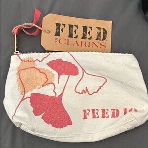 Clarins Canvas Pouch with Red and Orange Floral Design